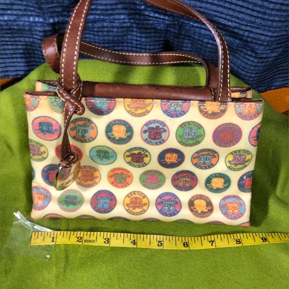 Vintage Dooney & Bourke Medallion Tiney East/West Bag with pastel circular